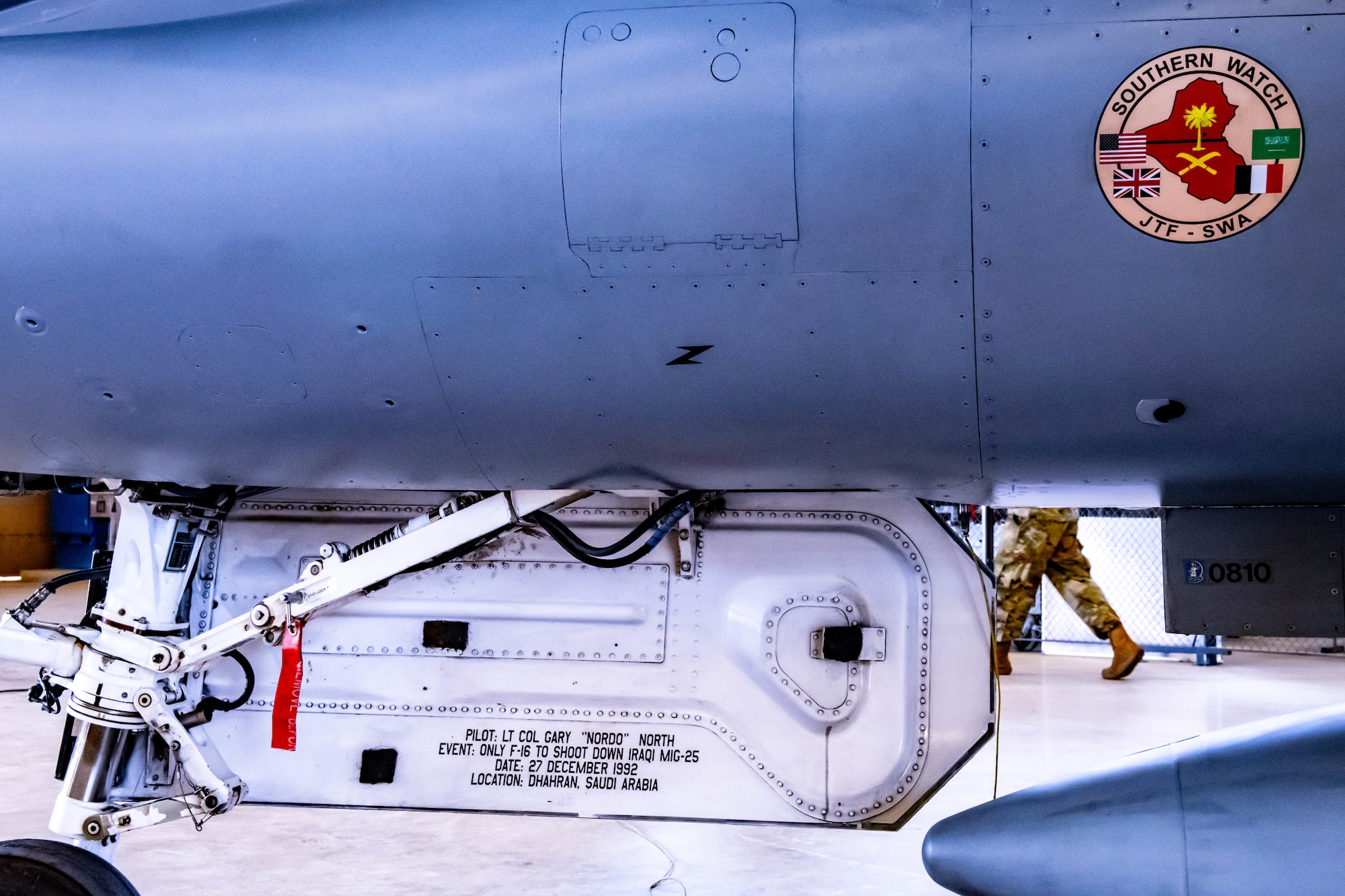A bay door of an F-16D Fighting Falcon sits ajar during an unveiling ceremony at the 310th Air Maintenance Unit hanger June 17, 2022, at Luke Air Force Base, Arizona.