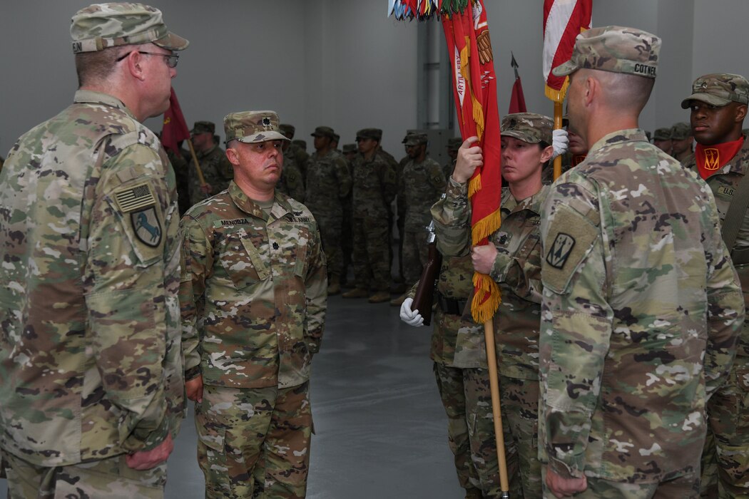 Lt. Col. Paul Mendoza, the new commander of the 4th Battalion 3rd Air Defense Artillery Regiment, awaits to be handed the 4-3 ADA colors during a change of command ceremony June 17, 2022, at Al Dhafra Air Base, United Arab Emirates. The 4-3 ADA is the oldest Air Defense Battalion in the active U.S. Army and was originally constituted on May 9, 1794.
