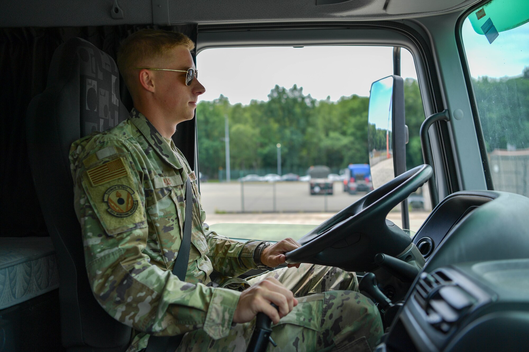 U.S. Air Force Airman 1st Class Riston Mais, 86th Munitions Squadron conventional maintenance technician, drives a 26-ton truck at Ramstein Air Base, Germany, June 21, 2022.
