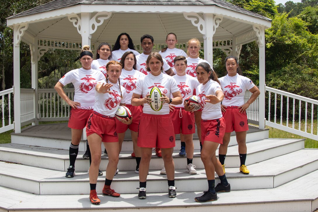 The USMC Rugby Team gathers for a group photo at Marine Corps Air Station Beaufort, June 21, 2022. The USMC Rugby Team is one of the many teams from the Marine Corps Sports Programs, which enables exceptional Marine athletes to compete and play sports they are passionate about and enhance the fitness and resilience of Marines. (U.S. Marine Corps photo by Lance Cpl. Nathan Saucier)