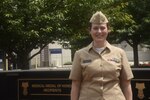 Lt. Cmdr. Sara Robinson, chair of the infection control and prevention committee at Walter Reed National Military Medical Center (WRNMMC), poses for a photo at WRNMMC in Bethesda, Maryland, June 2, 2022. Robinson was speaking about the monkeypox virus and what the public should know about the disease.