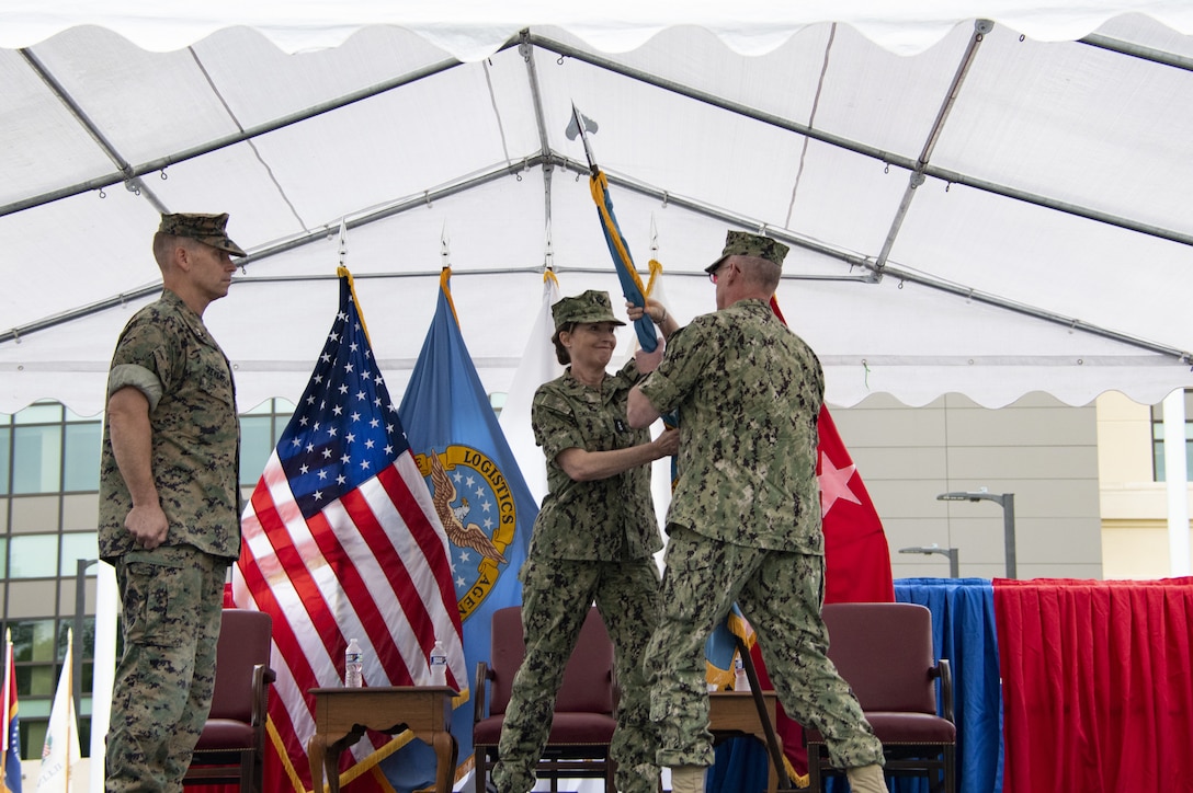 Passing of the DLA flag at DLA Distribution change of command ceremony.
