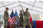 Passing of the DLA flag at DLA Distribution change of command ceremony.