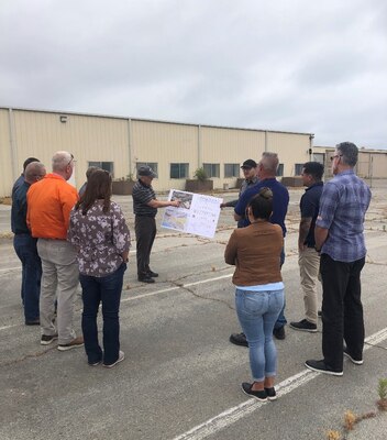 Representatives from the Defense Logistics Agency-Disposition Services, Marine Corps Logistics Command, Marine Force Storage Command, and Marine Corps Base Camp Pendleton (MCBCP) review draft proposals during a site survey conducted at the San Onofre Nuclear Generating Station adjacent to MCBCP, Calif., Wednesday, May 25