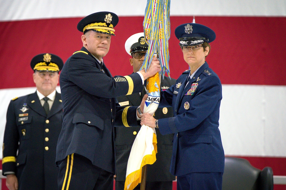 A military change of command is shown.