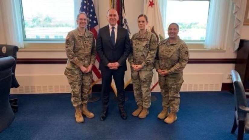 Gabriel Camarillo, Under Secretary of the U.S. Army, poses for a photo with Maj. Sam Winkler and team at the Pentagon.