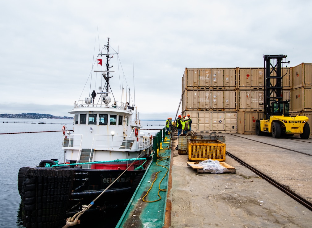 Crews load supplies onto the Naknek Trader during a visit to Naval Magazine Indian Island, Washington March 29, 2022. Indian Island is the U.S. Navy’s only deep-water ammunition port on the West Coast, where the installation can provide conventional ordnance support to vessels ranging from destroyers to submarines and aircraft carriers. (U.S. Navy photo by Mass Communication Specialist 2nd Class Gwendelyn L. Ohrazda)