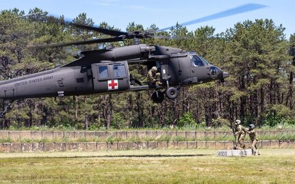 As part of annual training, the 238th Medevac Company, NHARNG, conducts sling-load training June 22, 2022, at Joint Base Cape Cod in Bourne, Mass.