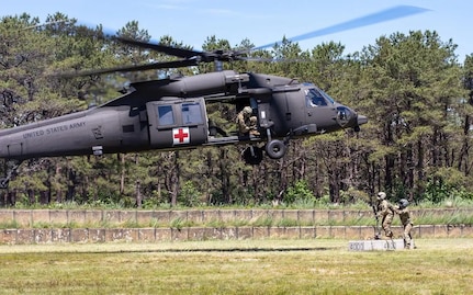 As part of annual training, the 238th Medevac Company, NHARNG, conducts sling-load training June 22, 2022, at Joint Base Cape Cod in Bourne, Mass.