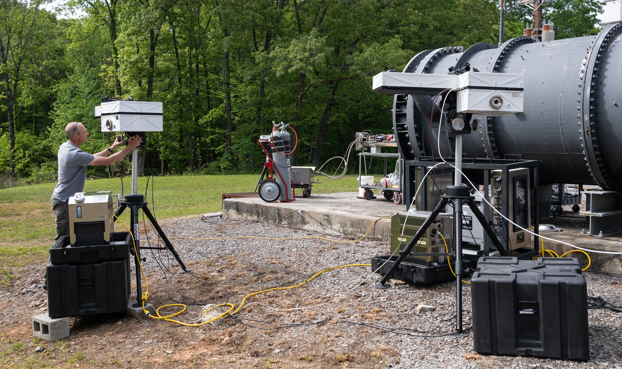 A man positions a piece of equipment