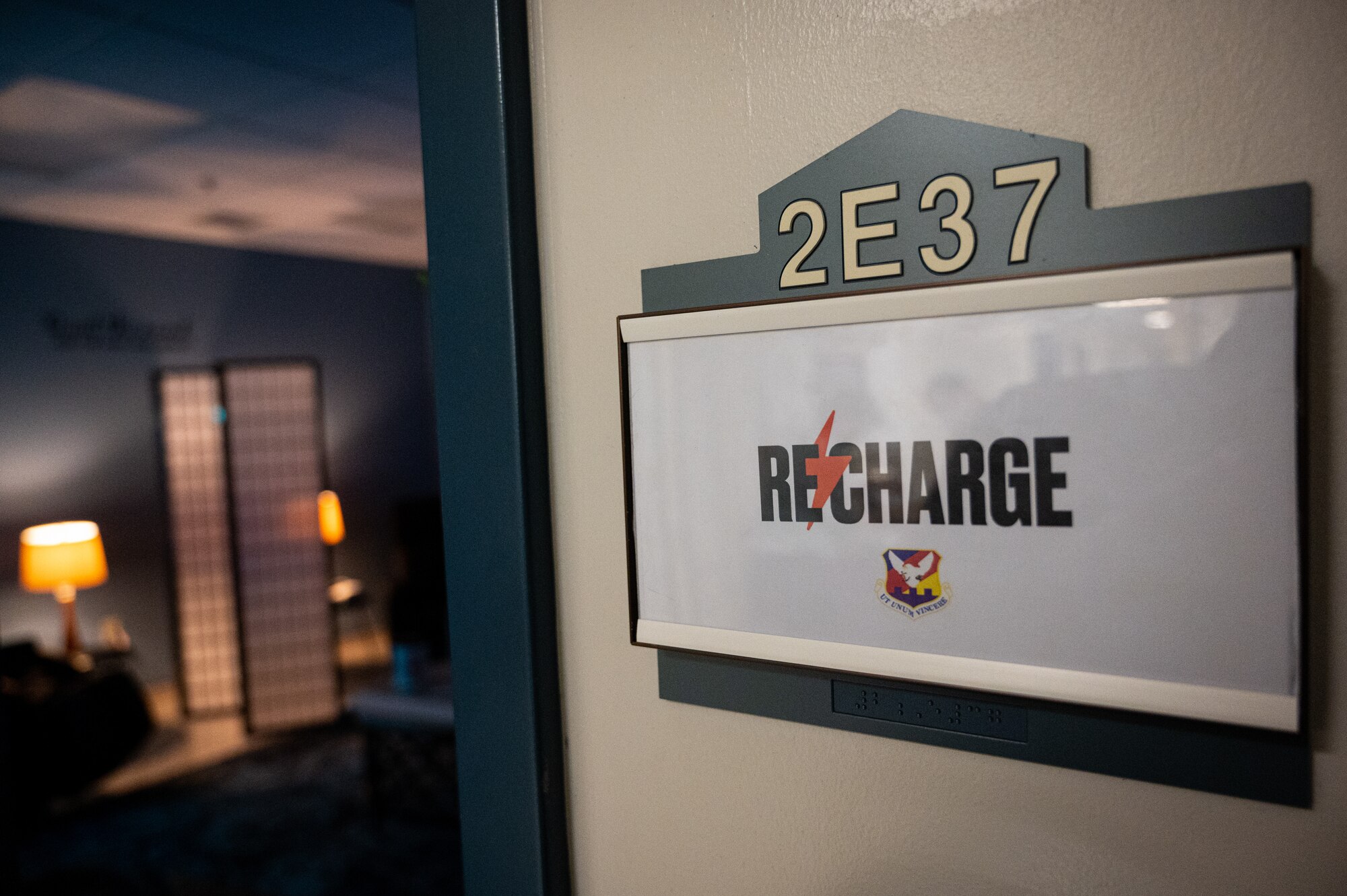 A recharge room sign is posted.