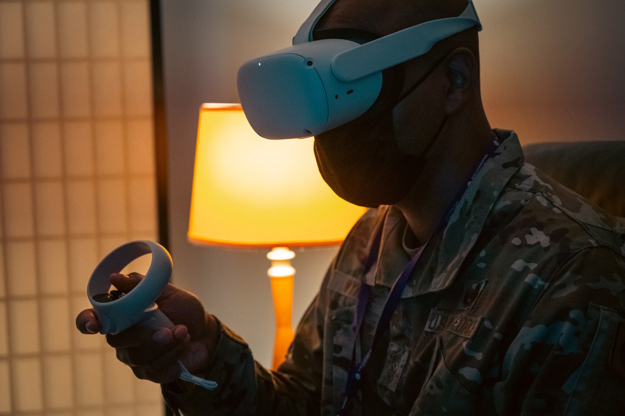 U.S. Air Force Chief Master Sgt. Michael Wynne, 87th Air Base Wing command chief, demonstrates the use of meditation software on an Oculus Quest 2 virtual reality headset.
