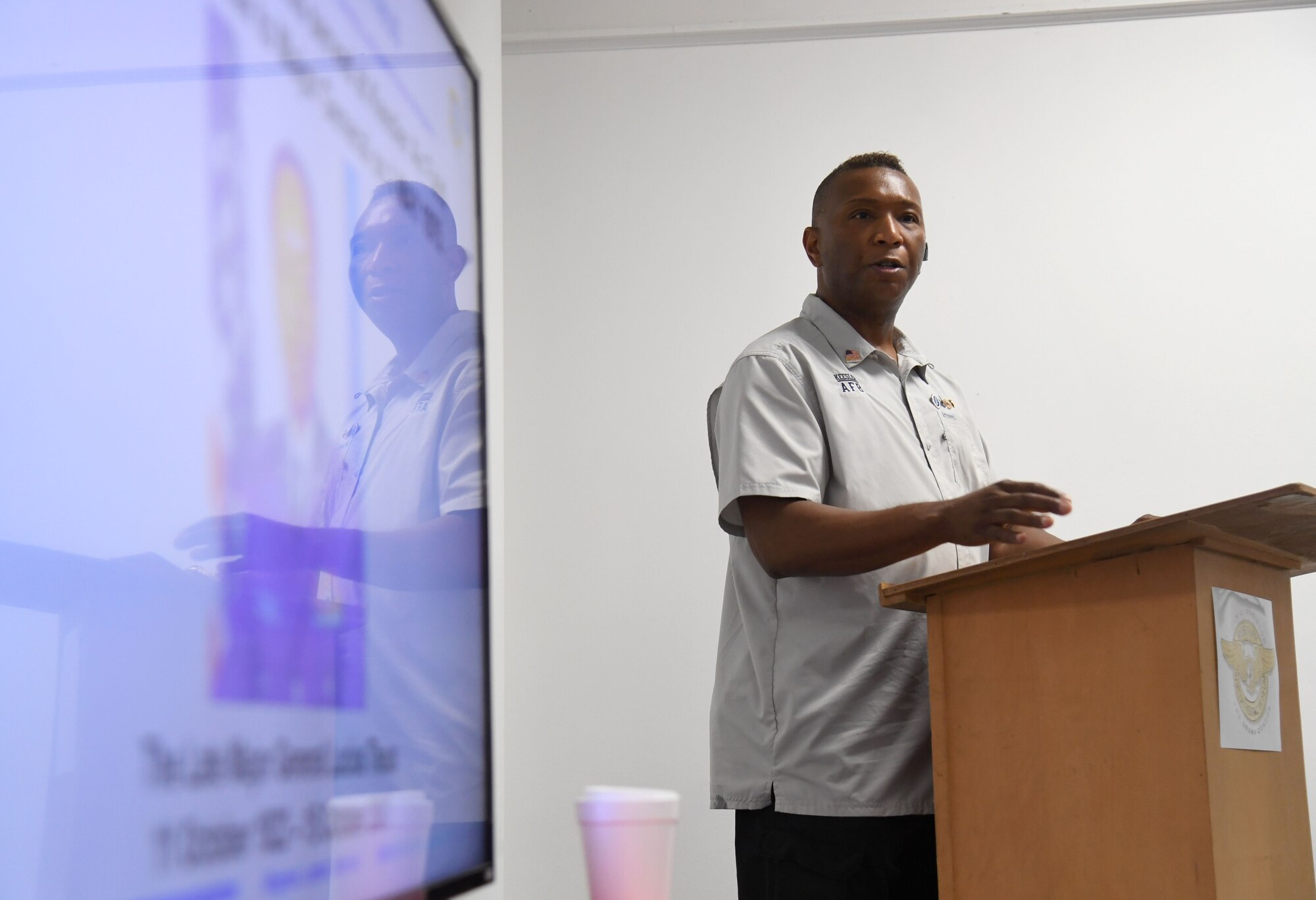 Tyrone Scott, 81st Training Wing historian, discusses the heritage of Keesler Air Force Base and the 81st TRW during a summer camp session inside the Mississippi Aviation Heritage Museum, Gulfport, Mississippi, June 27, 2022. More than 15 school-aged children attended the community outreach event. (U.S. Air Force photo by Kemberly Groue)