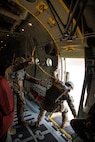 U.S. Army Soldiers assigned to the 19th Special Forces Group (Airborne), Utah Army National Guard, perform the jumpmaster safety checks required before all the jumpers can exit the plane for a friendship airborne operation in Grier Labouihi, Morocco, during African Lion 22, on June 19, 2022.