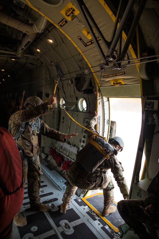 U.S. Army Soldiers assigned to the 19th Special Forces Group (Airborne), Utah Army National Guard, perform the jumpmaster safety checks required before all the jumpers can exit the plane for a friendship airborne operation in Grier Labouihi, Morocco, during African Lion 22, on June 19, 2022.