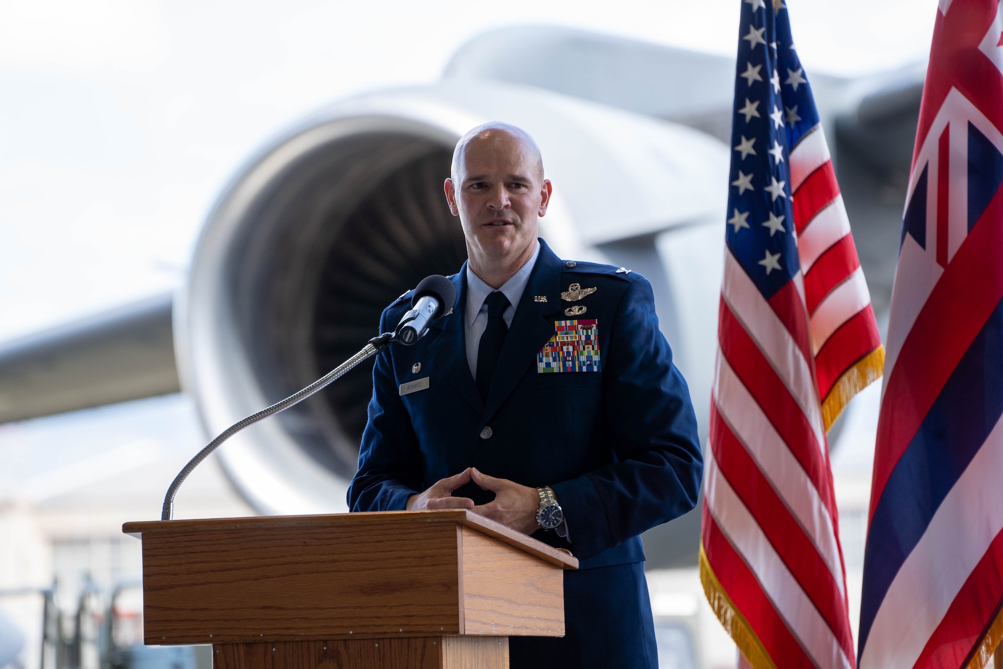 U.S. Air Force Col. Kyle A. Benwitz, 515th Air Mobility Operations Wing commander, addresses the audience during the wing's June 28, 2022 change of command ceremony.