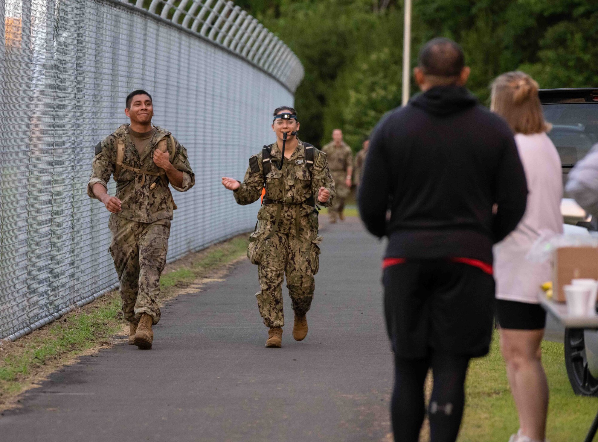 Members from Team Misawa come up to the last checkpoint on their first lap during a Norwegian Foot March at Misawa Air Base, Japan, June 25, 2022.