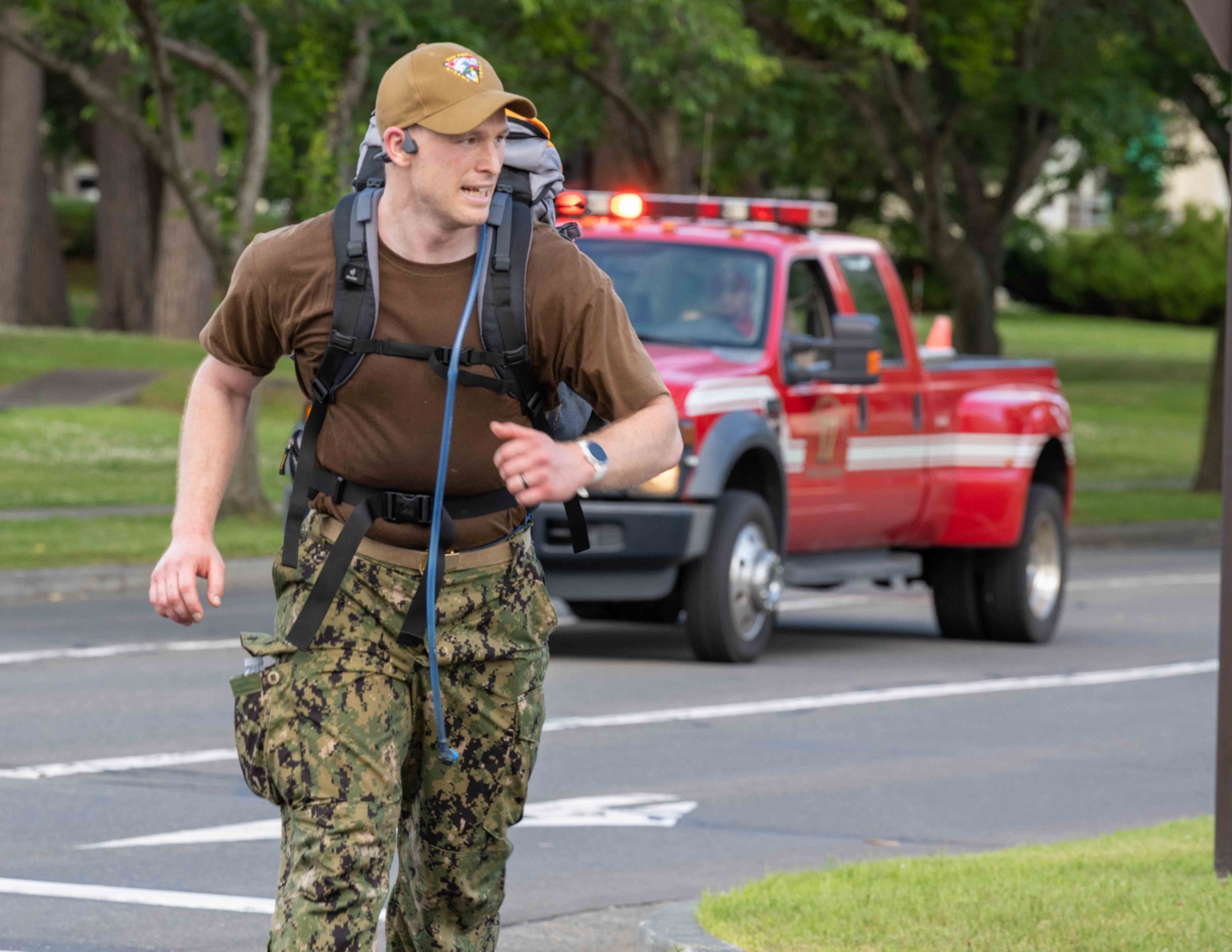 A participant completes the Norwegian Foot March in 1st place with just over four hours at Misawa Air Base, Japan, June 25, 2022.