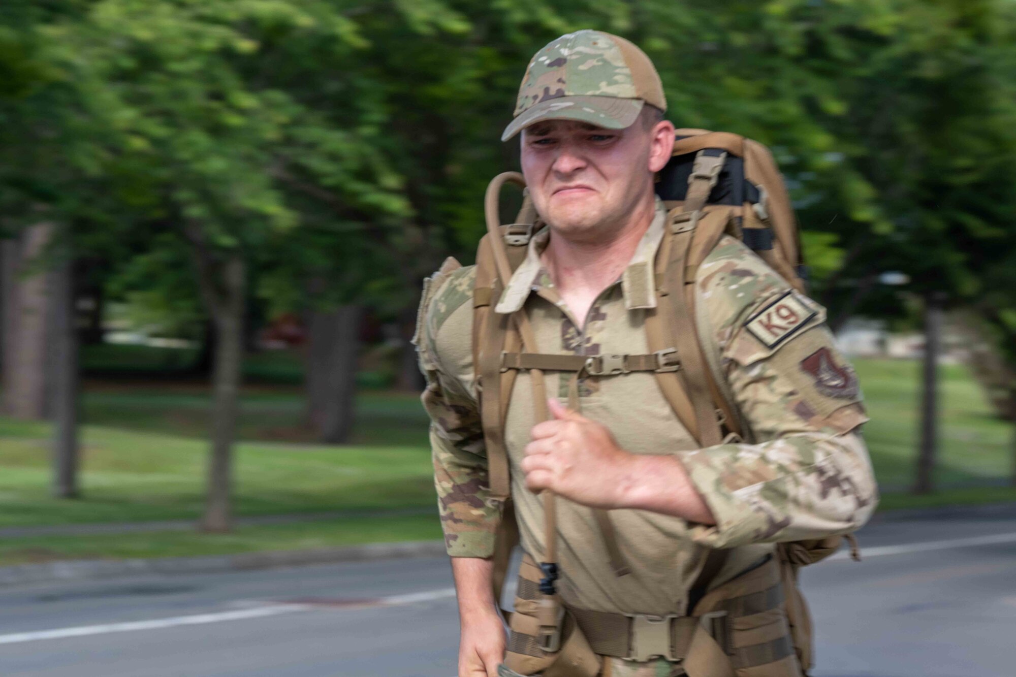 A participant pushes to cross the finish line during a Norwegian Foot March at Misawa Air Base, Japan, June 25, 2022.