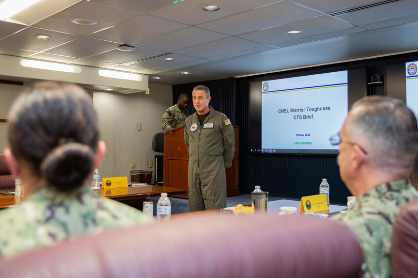 Rear Adm. Pete Garvin, commander, Naval Education and Training Command, speaks with a Warrior Toughness (WT) working group during an offsite meeting at Naval Air Station Pensacola, June 23, 2022.