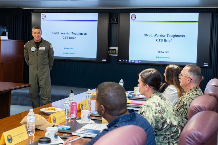 Rear Adm. Pete Garvin, commander, Naval Education and Training Command, speaks with a Warrior Toughness (WT) working group during an offsite meeting at Naval Air Station Pensacola, June 23, 2022.