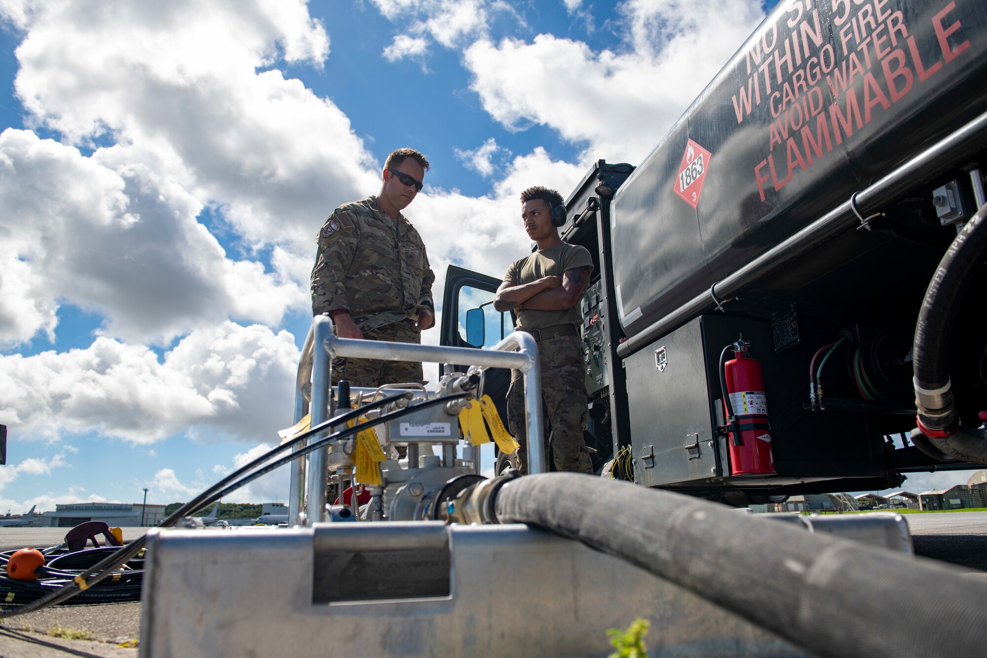 Airmen from the 18th Logistics Readiness Squadron hot pit refuel a F-15C Eagle with the Versatile Integrating Partner Equipment Refueling (VIPER) kit