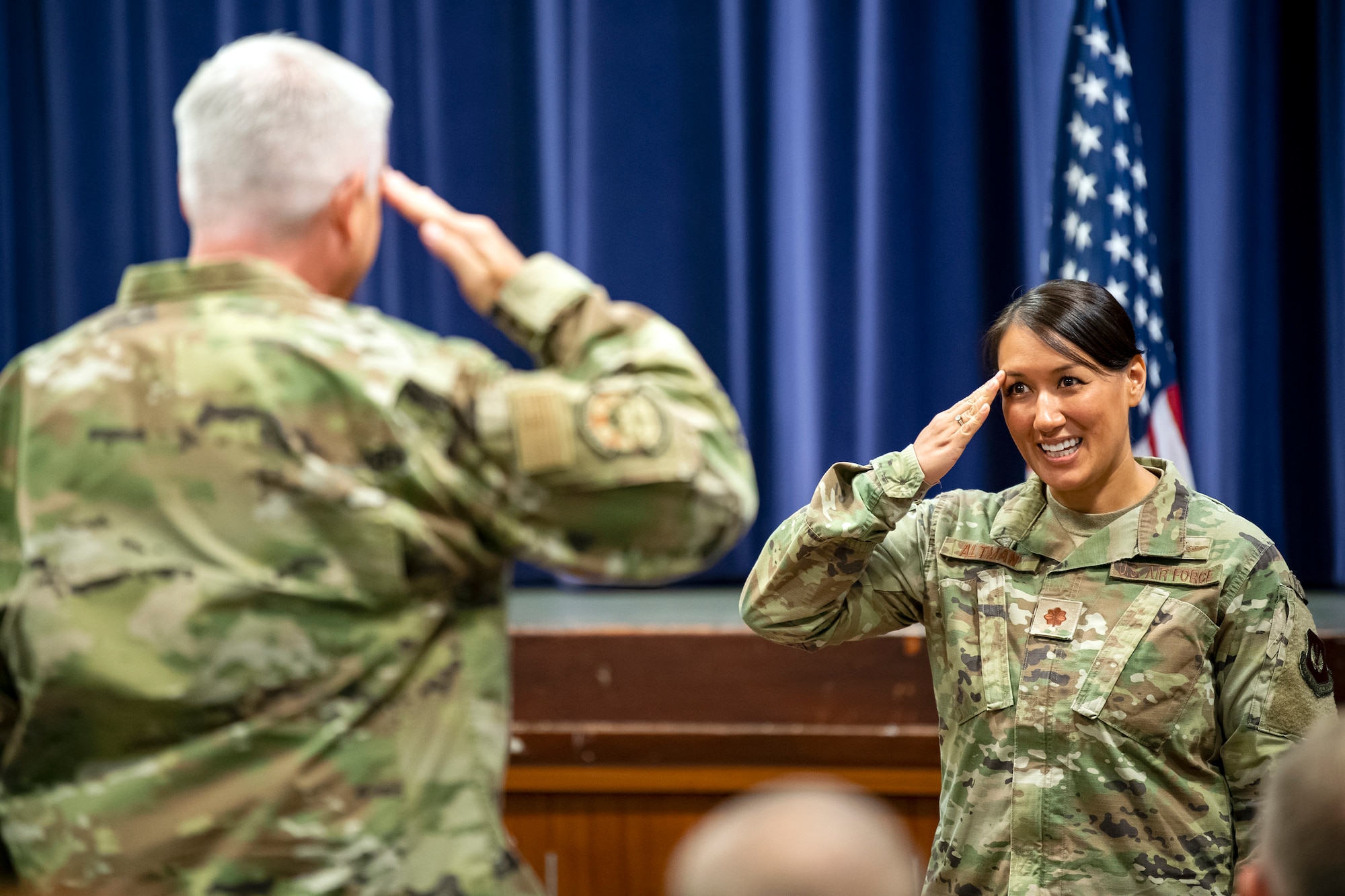 U.S. Air Force Maj. Amanda Altman, right, 422d Communications Squadron incoming commander, receives her first salute after assuming command at RAF Croughton, England, June 27, 2022. Altman completed an Air University Fellowship at Maxwell Air Force Base, Alabama, prior to assuming command of the 422d CS. (U.S. Air Force photo by Staff Sgt. Eugene Oliver)