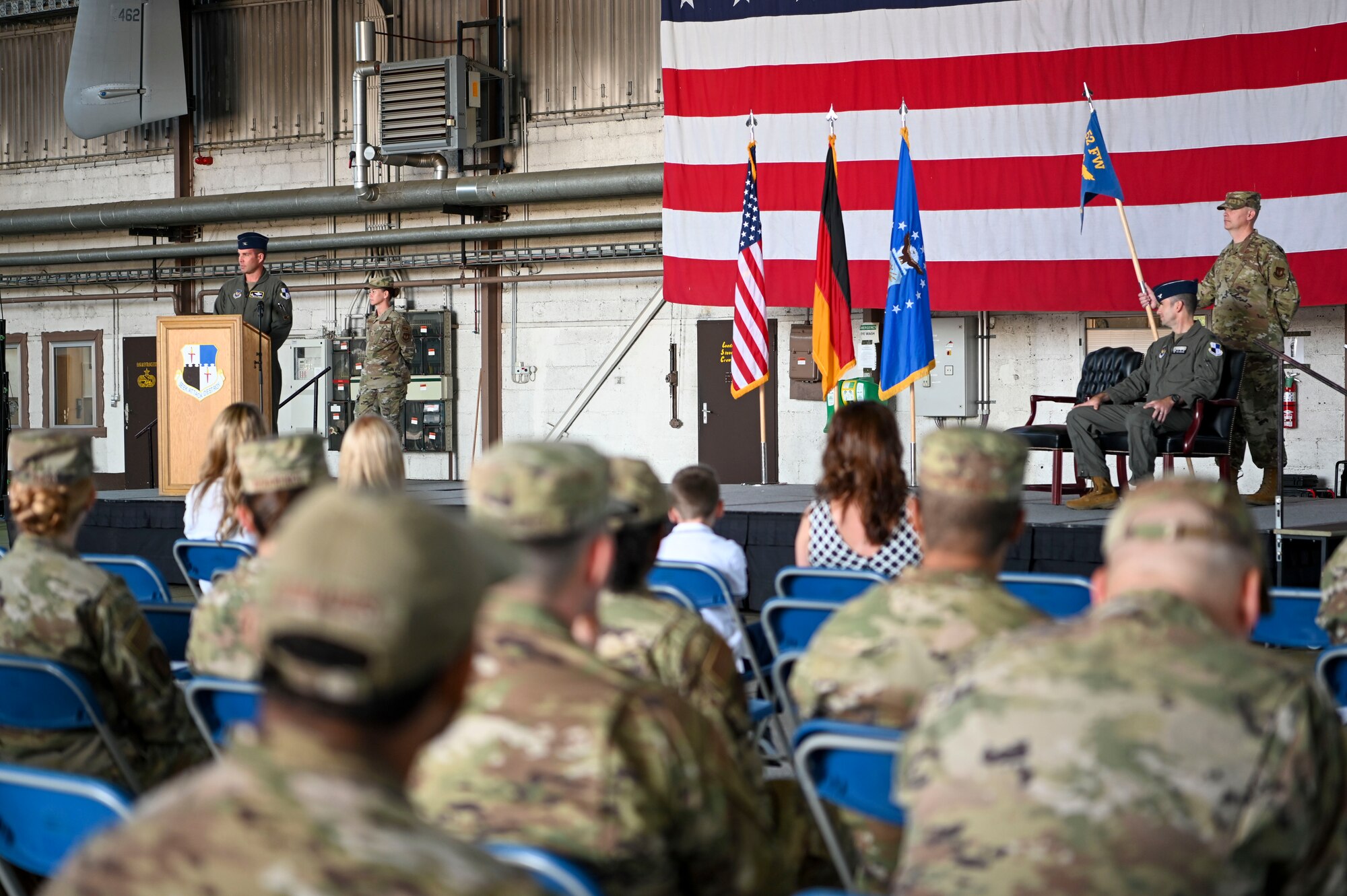 Col. Leslie Hauck, 52nd Fighter Wing commander, gives a speech during the 52nd Operations Group assumption of command ceremony, June 28, 2022, on Spangdahlem Air Base, Germany. Command of the 52nd OG was assumed by Col. Thomas Graham. (U.S. Air Force photo by Senior Airman Jessica Sanchez-Chen)