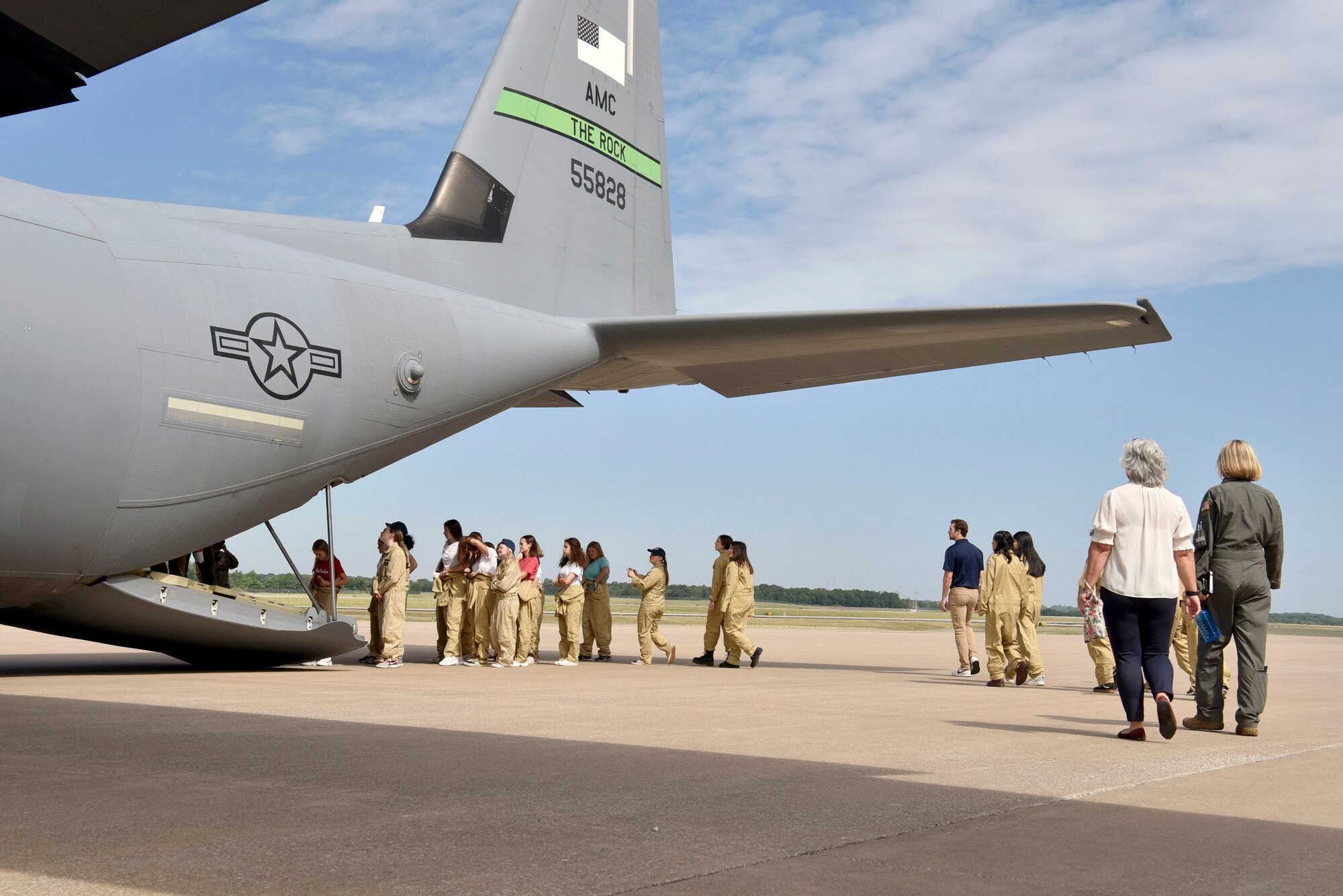 Students tour a C-130J Super Hercules aircraft.