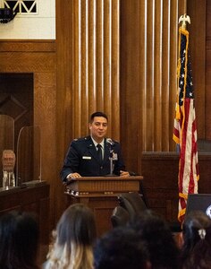 U.S. Air Force Capt. Alcides Silva, 188th Force Support Squadron assistant director for personnel, addresses the crowd at a naturalization ceremony in the Judge Isaac C. Parker Federal Courtroom, Fort Smith, Ark., June 24, 2022.