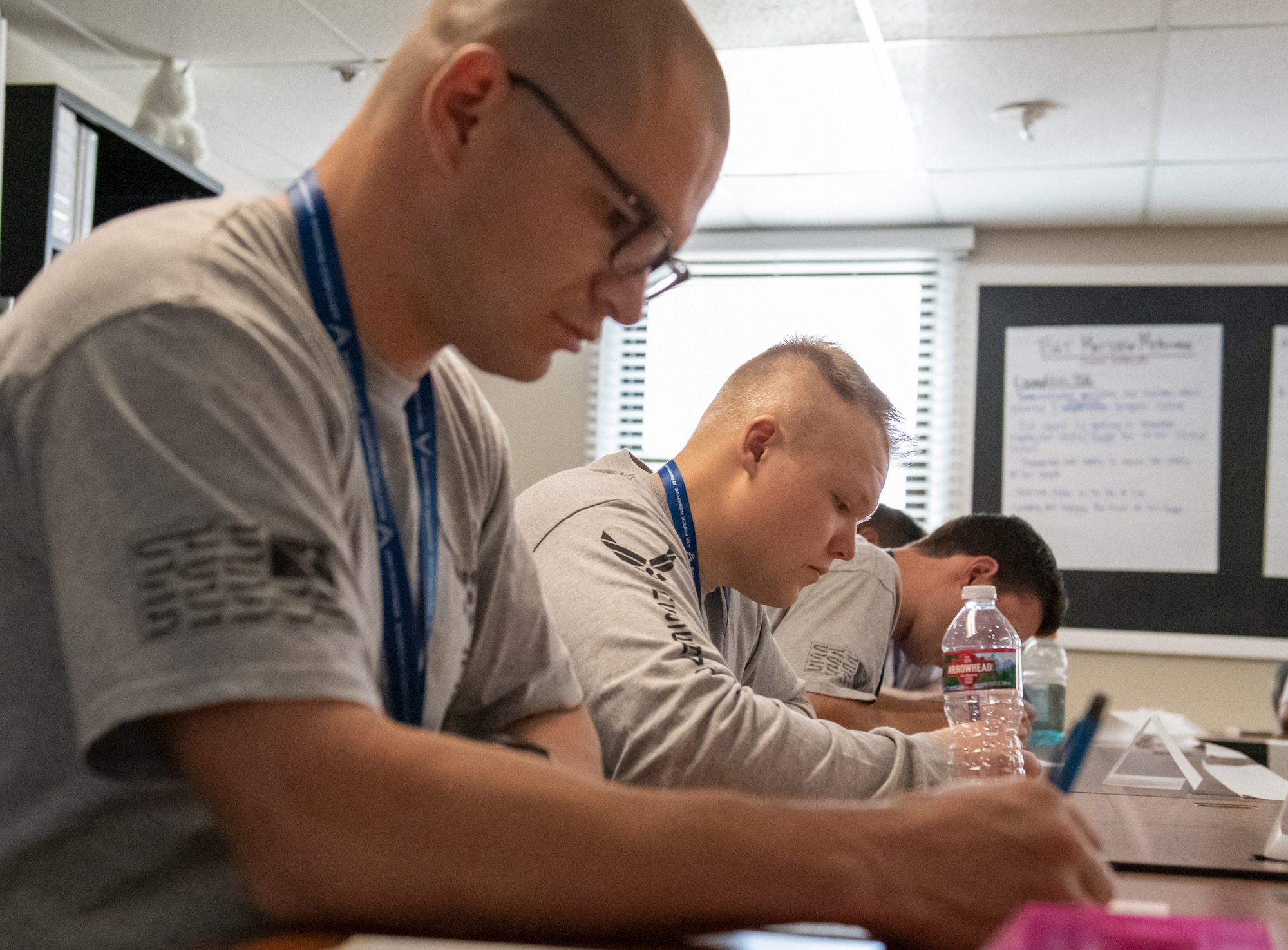 Trainees from the 419th Fighter Wing’s Development and Training Flight fill out forms to submit to their recruiters. Trainees maintain contact with their recruiters to ensure they are prepared for Basic Military Training. (U.S. Air Force photo by Senior Airman Kayla Ellis)