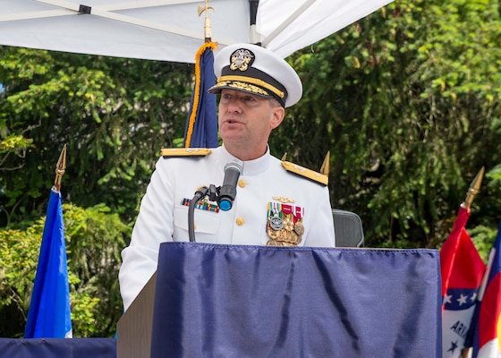 Rear Adm. Mark Behning, commander, Submarine Group 9, delivers a speech during a change of command ceremony onboard Naval Base Kitsap – Bangor, Wash., June 28, 2022.