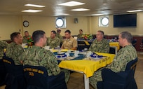 APRA HARBOR, Guam (June 10, 2022) Rear Adm. Rick Seif, Commander, Submarine Group 7 and regional triads meet for lunch aboard the Emory S. Land-class submarine tender USS Frank Cable (AS 40), June 10, 2022. Frank Cable, forward-deployed to the island of Guam, repairs, rearms, and re-provisions submarines and surface vessels in the Indo-Pacific region. (U.S. Navy photo by Mass Communication Specialist Seaman Wendy Arauz/Released)
