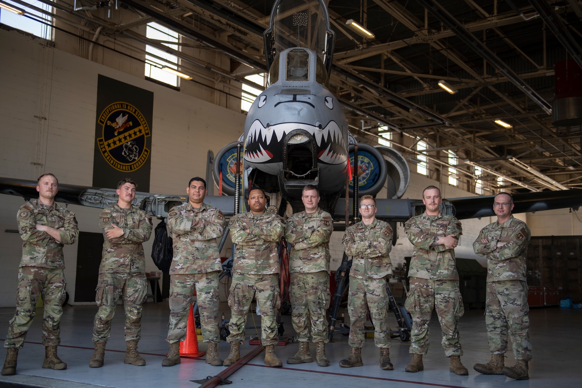 U.S. Air Force Airmen assigned to the 309th Aircraft Maintenance Group pose for a photo at Moody Air Force Base, Georgia, June 21, 2022. The 309th AMXG arrived from Hill Air Force Base, Utah, to remove and replace the wings on an A-10C Thunderbolt II. It took three weeks for the DEPOT team to extract and replace the wings on an A-10C. (U.S. Air Force photo by Airman 1st Class Rachel Coates)