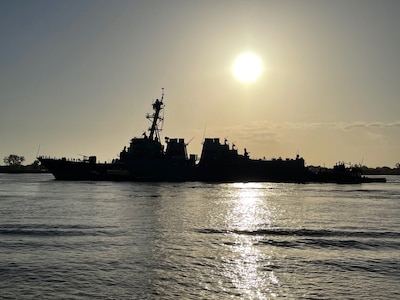 220422-N-WW980-018 NEW ORLEANS, (April 22, 2022) - USS Lassen heads down the Mississippi River back out toward the Gulf of Mexico.  The ship's departure from the "Big Easy" signaled the end of Navy Week New Orleans. The USS Lassen is headed next for Fleet Week Port Everglades in Fort Lauderdale, Florida beginning May 1.  Fleet Weeks are designed to show Americans the investment they have made in their Navy and increase the awareness of the Navy’s role and purpose in our national defense. (U.S. Navy photo by Jay Cope/Released)