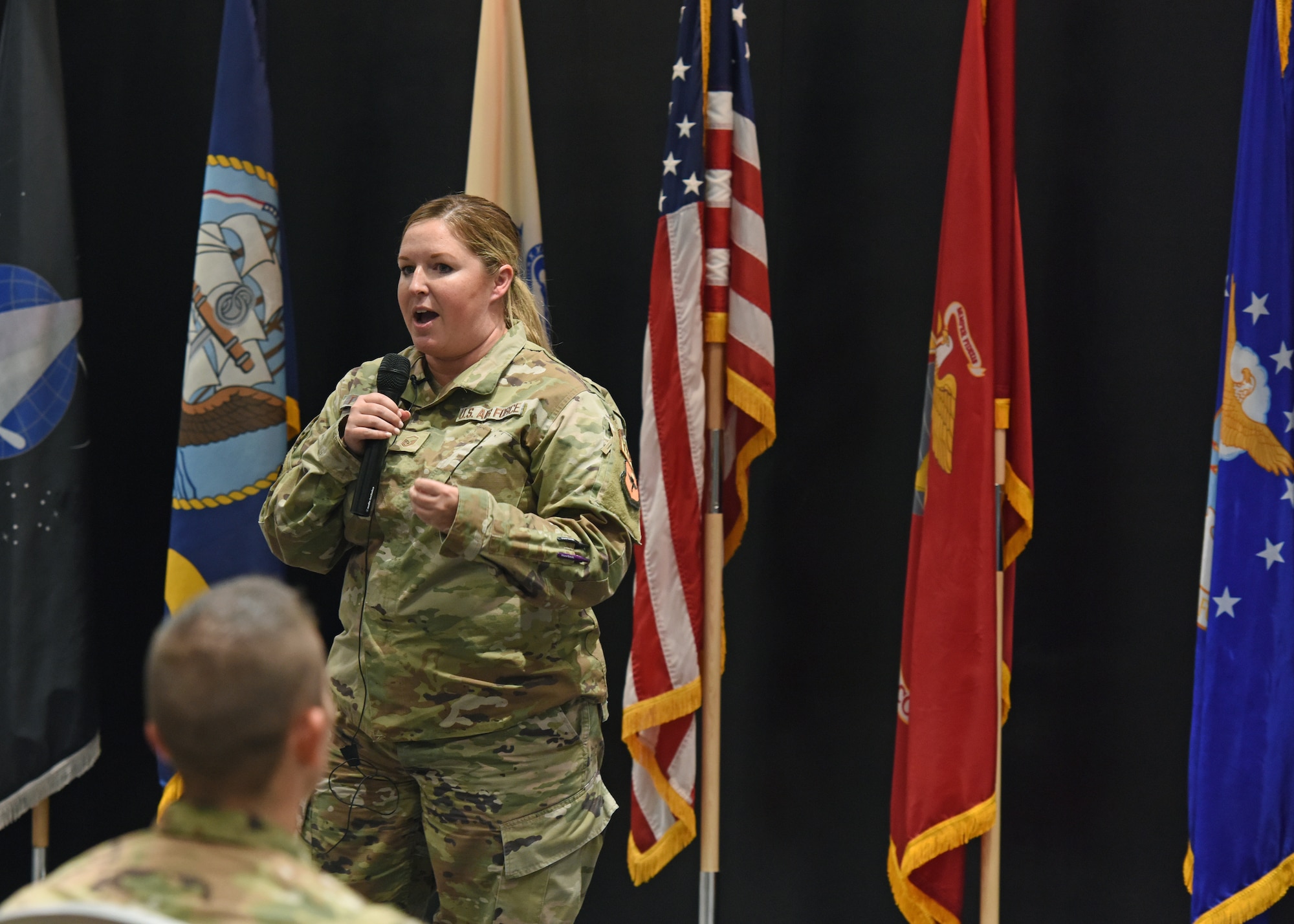 U.S. Air Force Master Sgt. Jennifer Thurman, 316th Training Squadron strategic curriculum developer, speaks during the Commander’s Call at Goodfellow Air Force Base, Texas, June 27, 2022. Thurman emphasized China’s history and local informatized war capabilities. (U.S. Air Force photo by Airman 1st Class Zachary Heimbuch)