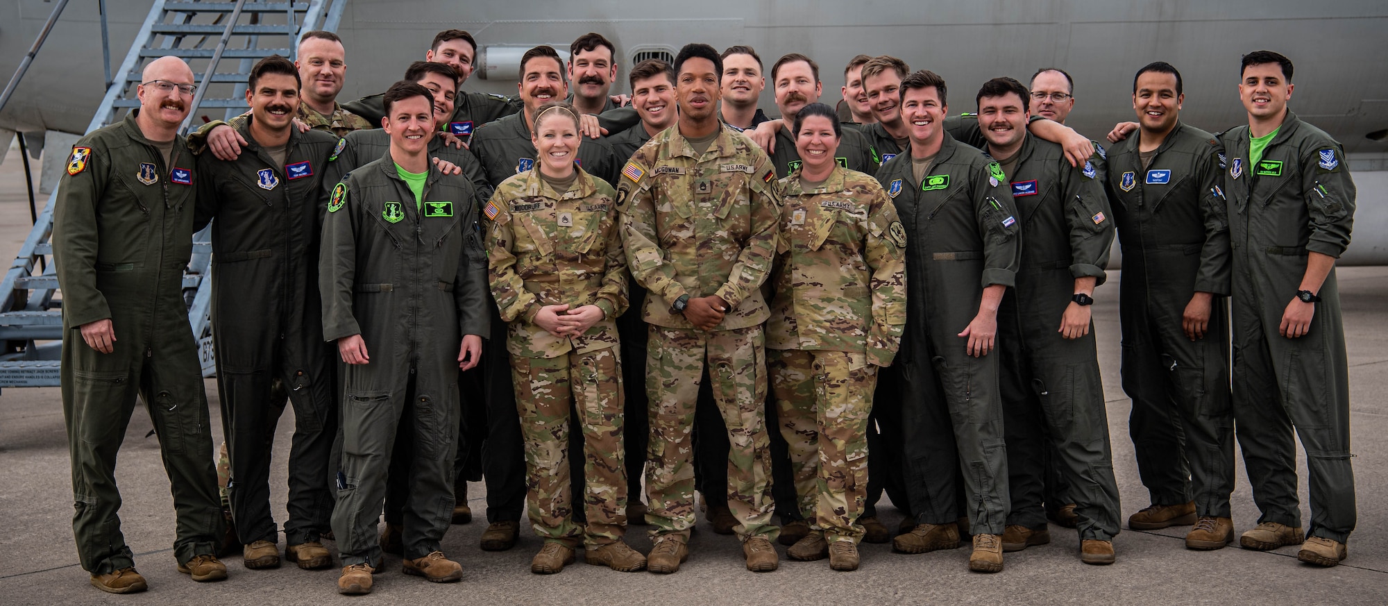 U.S. Air Force members of a Joint Surveillance Target Attack Radar System crew, stand in front of an E-8C JSTARS with U.S. Army personnel who flew their last flight as part of the JSTARS program at Ramstein Air Base, Germany, June 22, 2022. Army members have been a part of the JSTAR crew since 1994, working as liaisons between air and ground forces. (U.S. Air Force photo by Airman 1st Class Jared Lovett)