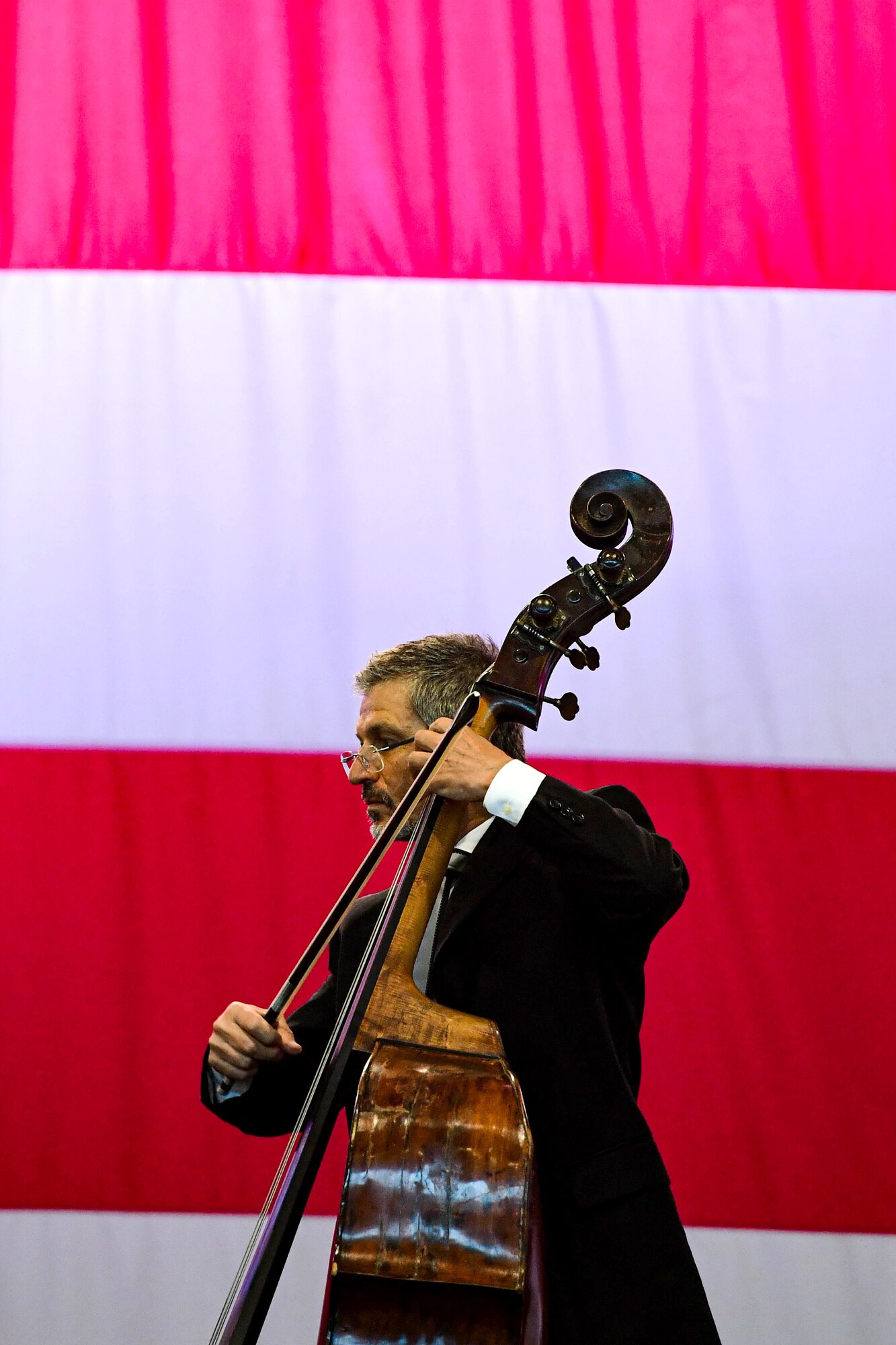U.S. Air Force Brig. Gen. Jason Bailey, 31st Fighter Wing Commander, speaks at the Chamber Orchestra “Nuova Orchestra da Camera Ferruccio Busoni” concert at Aviano Air Base, Italy, June 29, 2022. They were directed by Maestro Massimo Belli and performed “Melodies of the Century”. The goal of these events is to bring two nations together through music, international language and a sense of community. (U.S. Air Force photo by Senior Airman Noah Sudolcan)