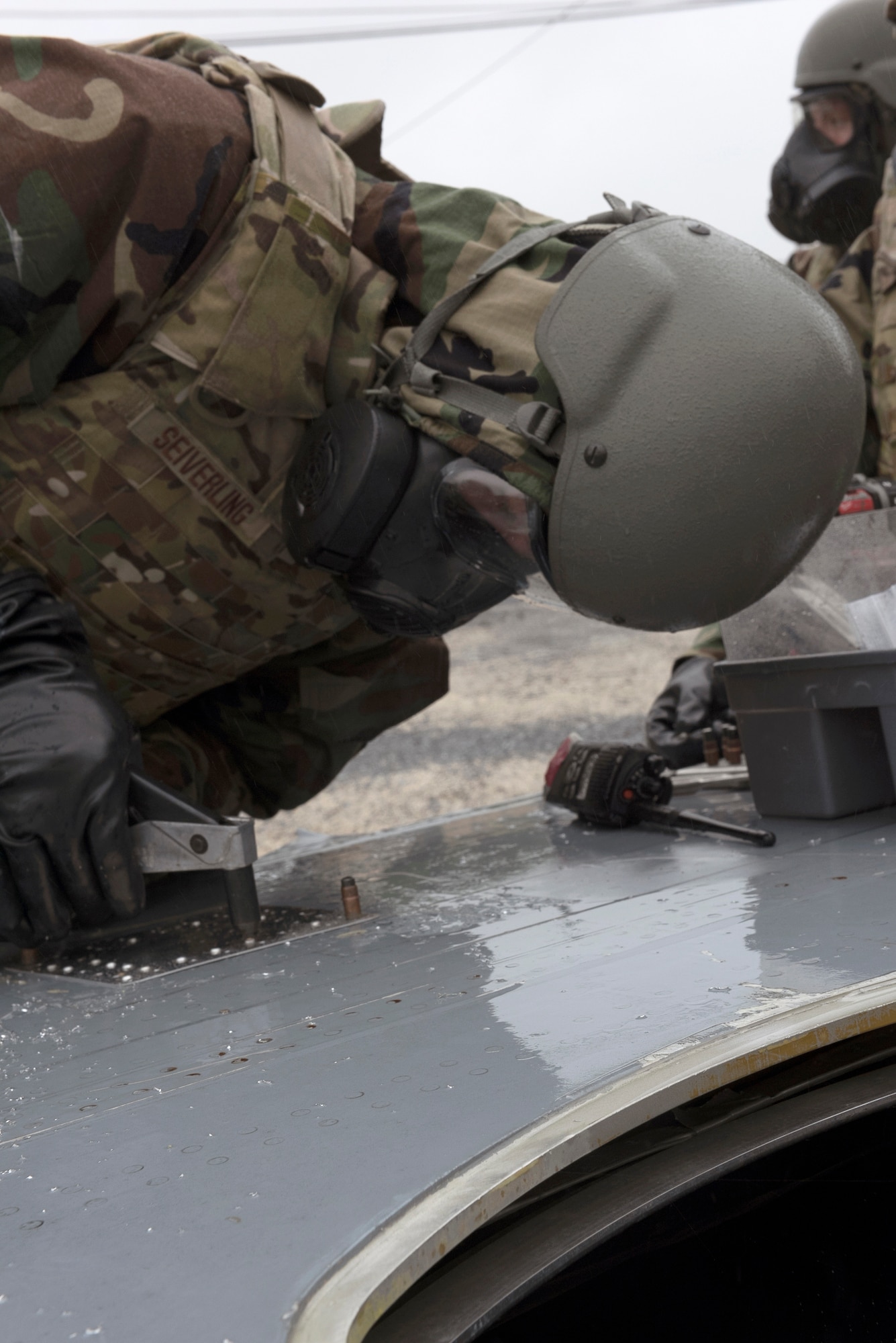 Master Sgt. Adam Seiverling, an aircraft structural craftsman 193rd Special Operations Aircraft Maintenance Squadron, Middletown, Pennsylvania Air National Guard, place rivets into a metal patch on a C-130 wing to repair a hole during a training exercise held at Fort Indiantown Gap, Annville, Pennsylvania June 23, 2022.