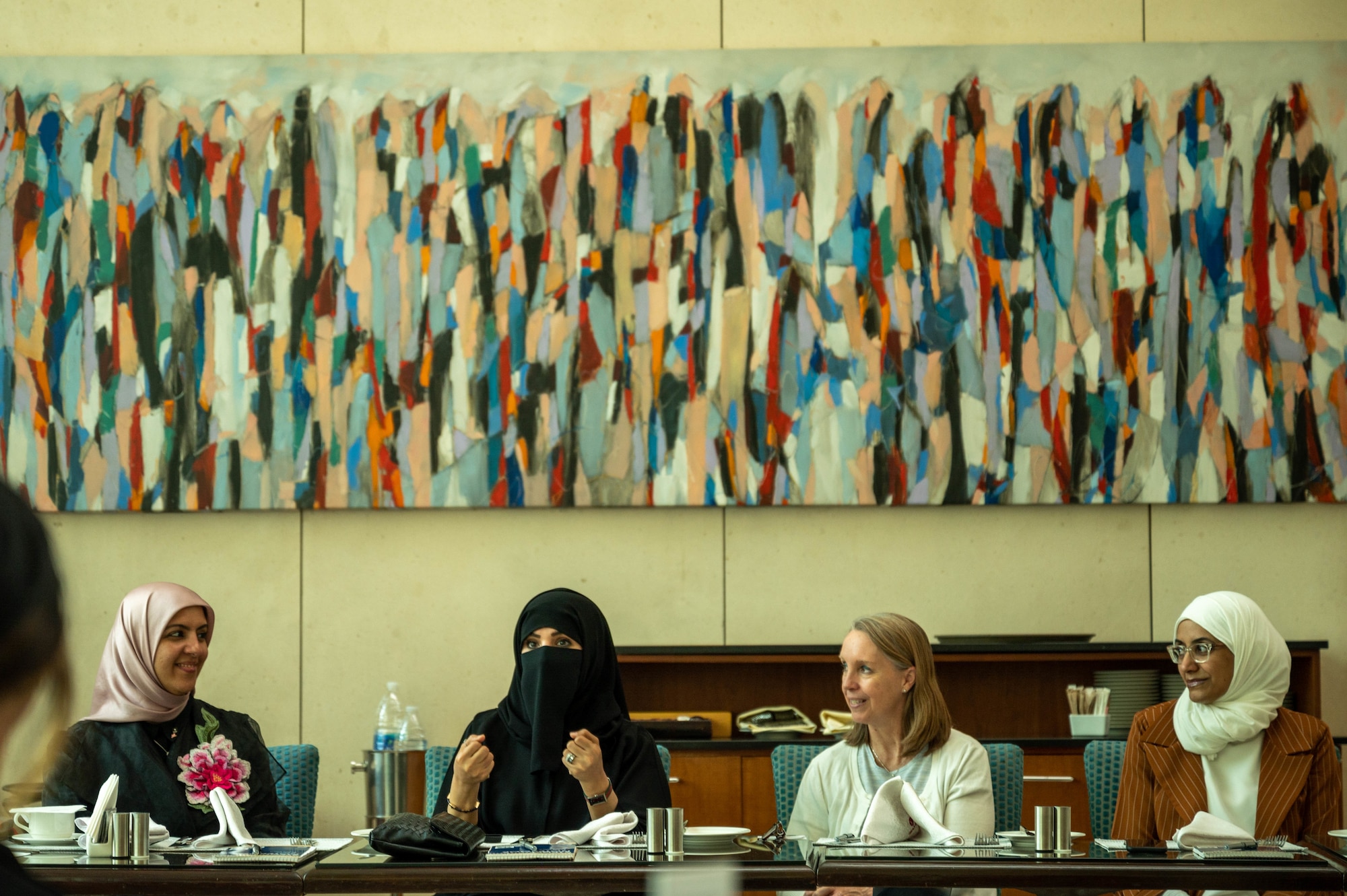 A Kuwaiti woman speaks at a Women’s Peace and Security Diwaniya hosted at the Courtyard Marriott in Kuwait City, Kuwait, June 21, 2022. Diwaniyas are a place to network, where people from different facets of society gather to discuss topics of interest, form alliances, close business deals or introduce people to associates. Historically, Diwaniyas have consisted of only men, but now have evolved into mixed gender, or even women only. (U.S. Air Force photo by Senior Airman Natalie Filzen)