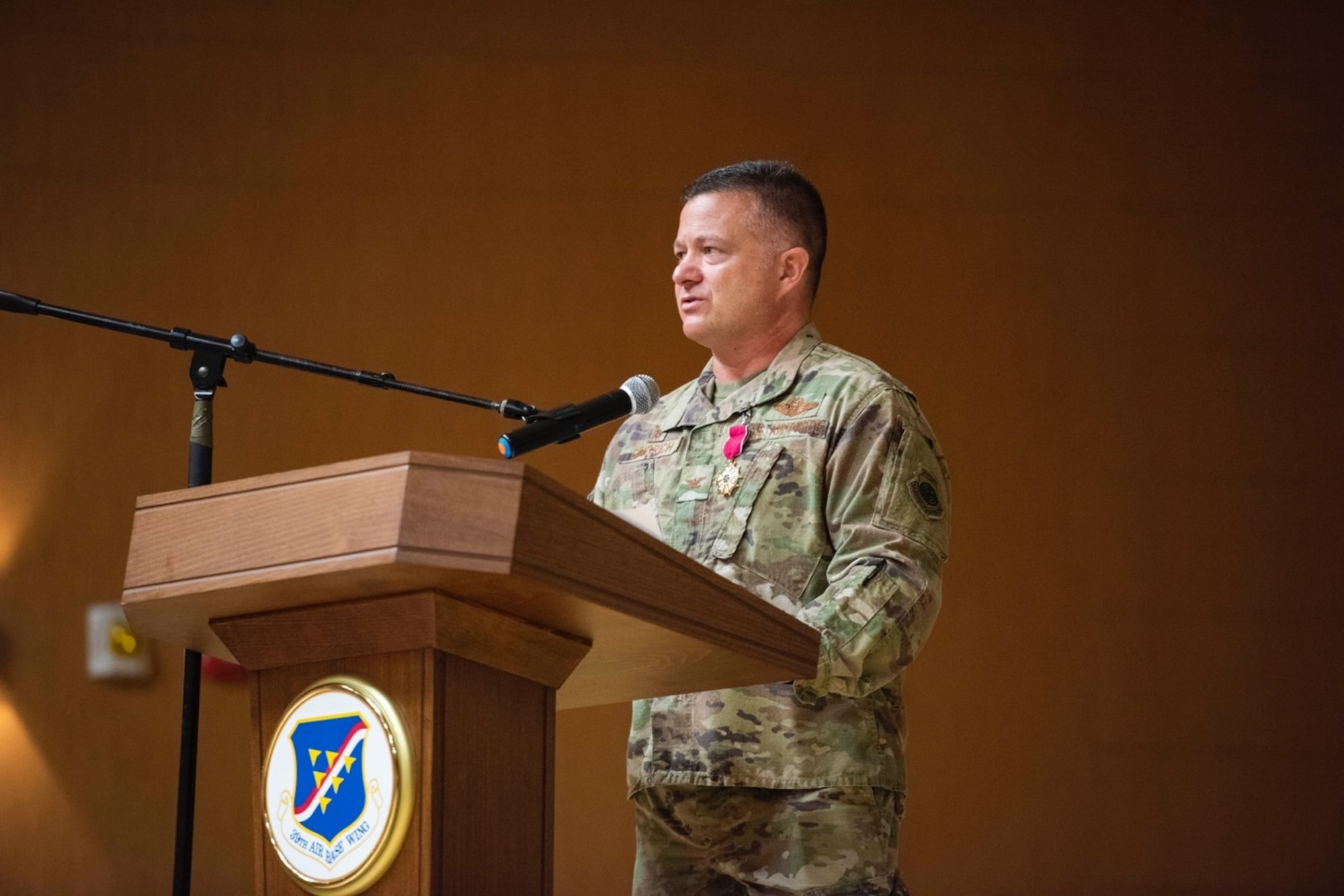 U.S. Air Force Col. Jason Gingrich, outgoing 39th Air Base Wing commander, delivers remarks during a change of command ceremony at Incirlik Air Base, Turkey, June 30, 2022. During the ceremony, Gingrich relinquished command of the 39th ABW to Maj. Gen. Derek France, Third Air Force commander, who then charged Col. Calvin Powell with leading the wing. The 39th ABW is charged with defending NATO’s southern flank under the auspices of 3rd AF, U.S. Air Forces in Europe – Air Forces Africa and U.S. European Command. The wing projects global power through strategic deterrence, agile combat support and enduring partnerships to defend U.S. interests and allies. (U.S. Air Force photo by Staff Sgt. Gabrielle Winn)