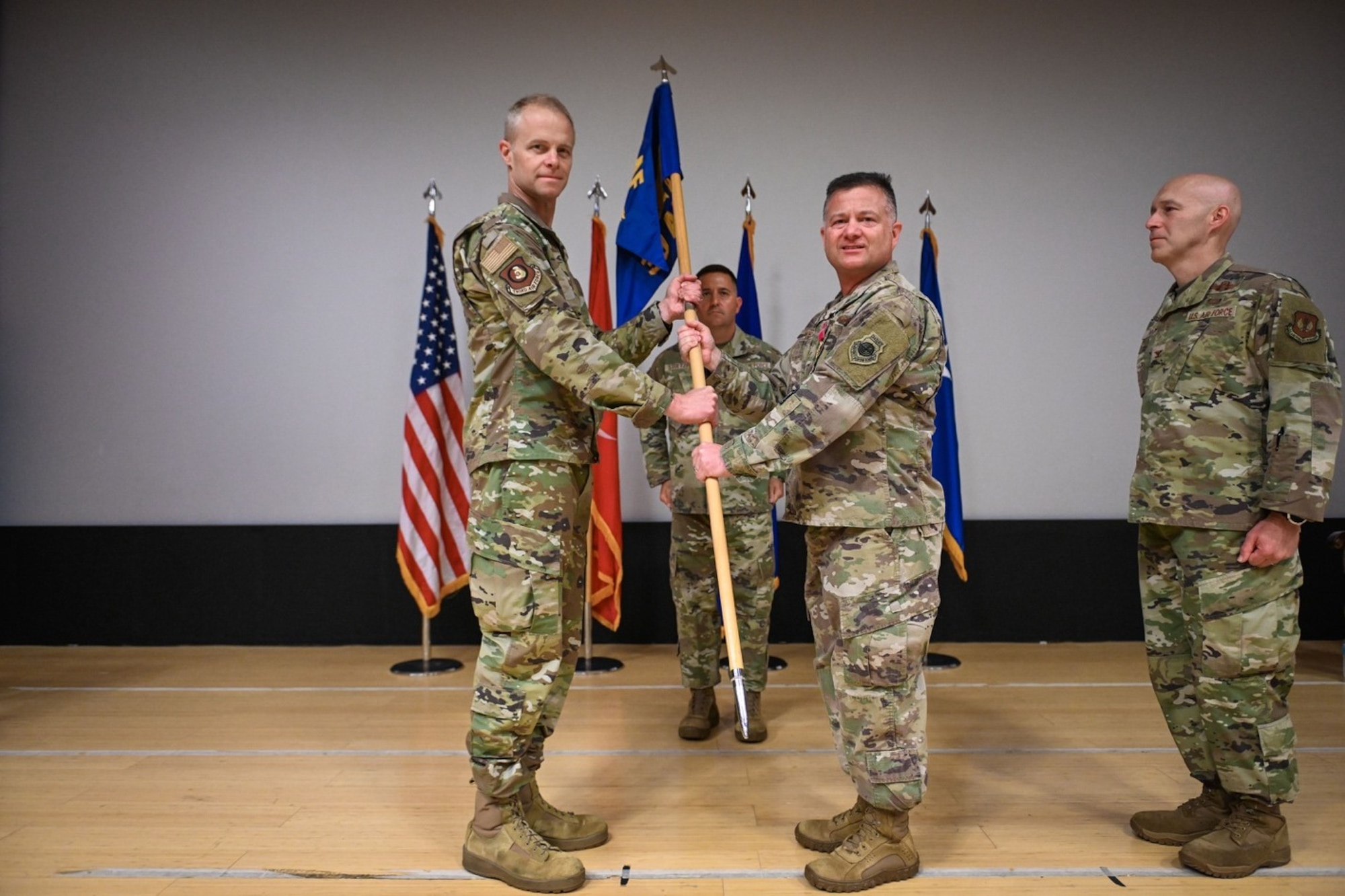 U.S. Air Force Col. Jason Gingrich (right), outgoing 39th Air Base Wing commander, relinquishes the guidon to Maj. Gen. Derek France, Third Air Force commander, during a change of command ceremony at Incirlik Air Base, Turkey, June 30, 2022. During the ceremony, Col. Calvin Powell replaced Gingrich as 39th ABW commander after serving as the vice commander of the 435th Air Ground Operations Wing and 435th Air Expeditionary Wing, at Ramstein AB, Germany. The 39th ABW is charged with defending NATO’s southern flank under the auspices of Third Air Force, U.S. Air Forces in Europe – Air Forces Africa and U.S. European Command. The wing projects global power through strategic deterrence, agile combat support and enduring partnerships to defend U.S. interests and allies. (U.S. Air Force photo by Senior Airman Joshua T. Crossman)