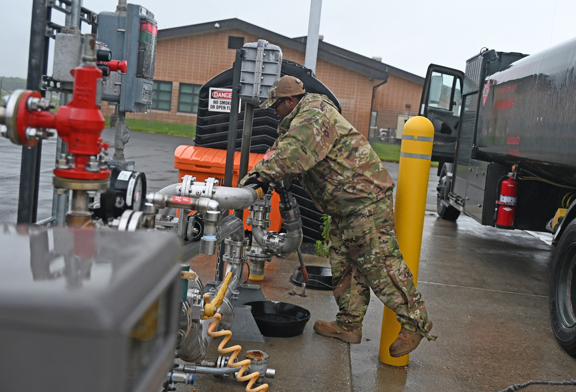 U.S. Air Force Staff Sgt. Terence Bowe, a fuels craftsman assigned to the 175th Mission Support Group, Maryland Air National Guard, puts away equipment after filling up a fuel truck at Warfield Air National Guard Base, Middle River, Md., June 23, 2022.