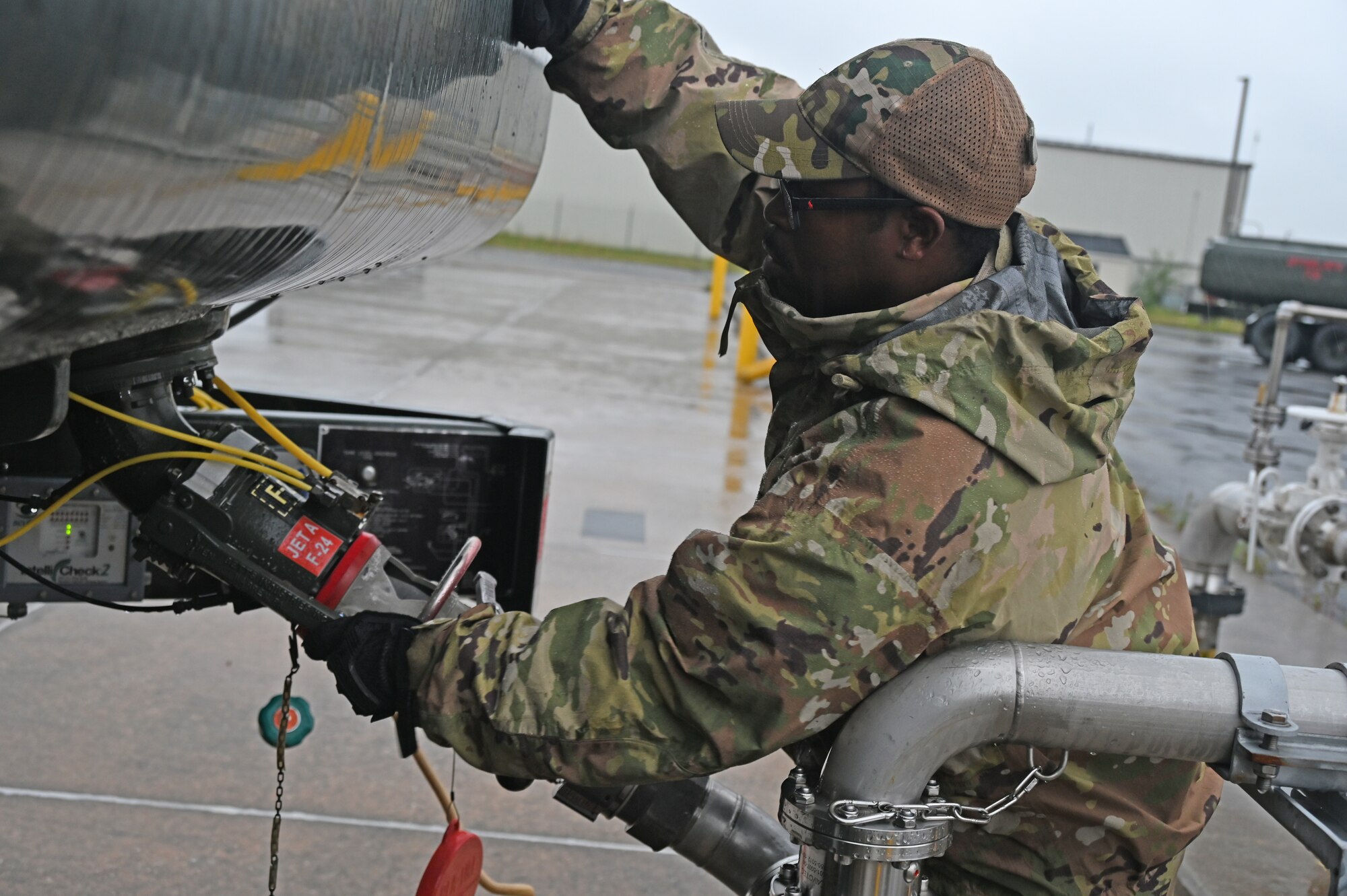 U.S. Air Force Staff Sgt. Terence Bowe, a fuels craftsman assigned to the 175th Mission Support Group, Maryland Air National Guard, fills a fuel truck with fuel at Warfield Air National Guard Base, Middle River, Md., June 23, 2022.