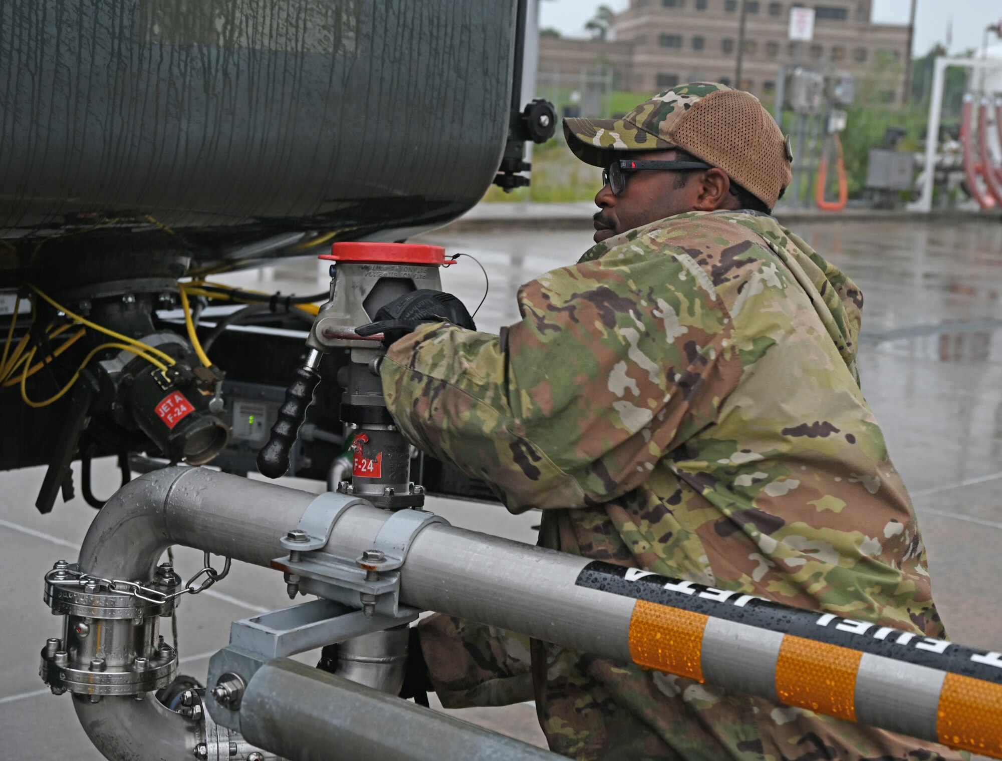 U.S. Air Force Staff Sgt. Terence Bowe, a fuels craftsman assigned to the 175th Mission Support Group, Maryland Air National Guard, fills a fuel truck with fuel at Warfield Air National Guard Base, Middle River, Md., June 23, 2022.