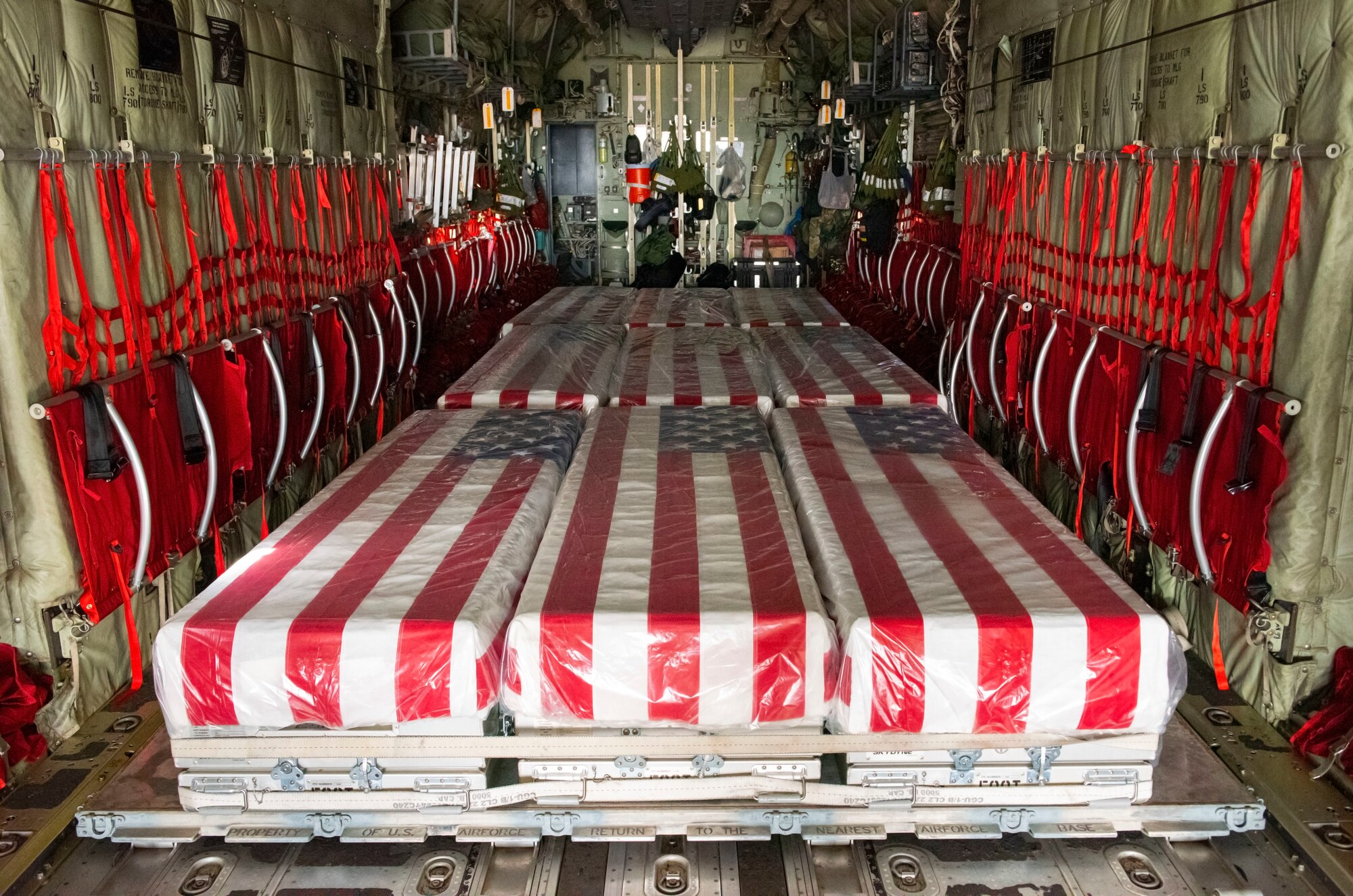 The 724th Air Mobility Squadron conducts an enroute dignified transfer of nine caskets containing the remains of unidentified service members at Aviano Air Base, June 27, 2022.
Suspected to be from WW2, the remains were located at the Florence American Cemetery. The Defense POW/MIA Accounting Agency coordinated the transfer of remains to forensic labs for DNA collection of the service member to help notify the families. (U.S. Air Force photo by Senior Airman Jessica Blair)