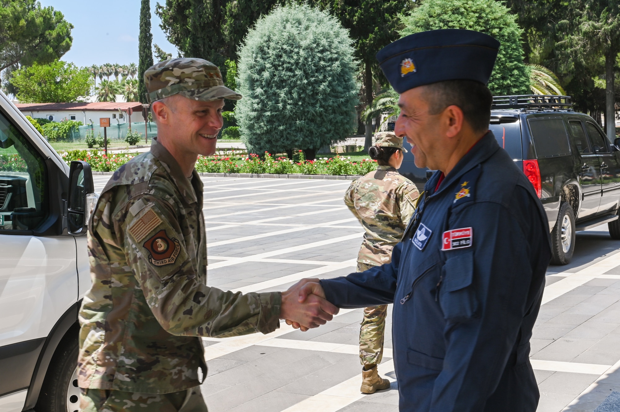 Men shake hands.