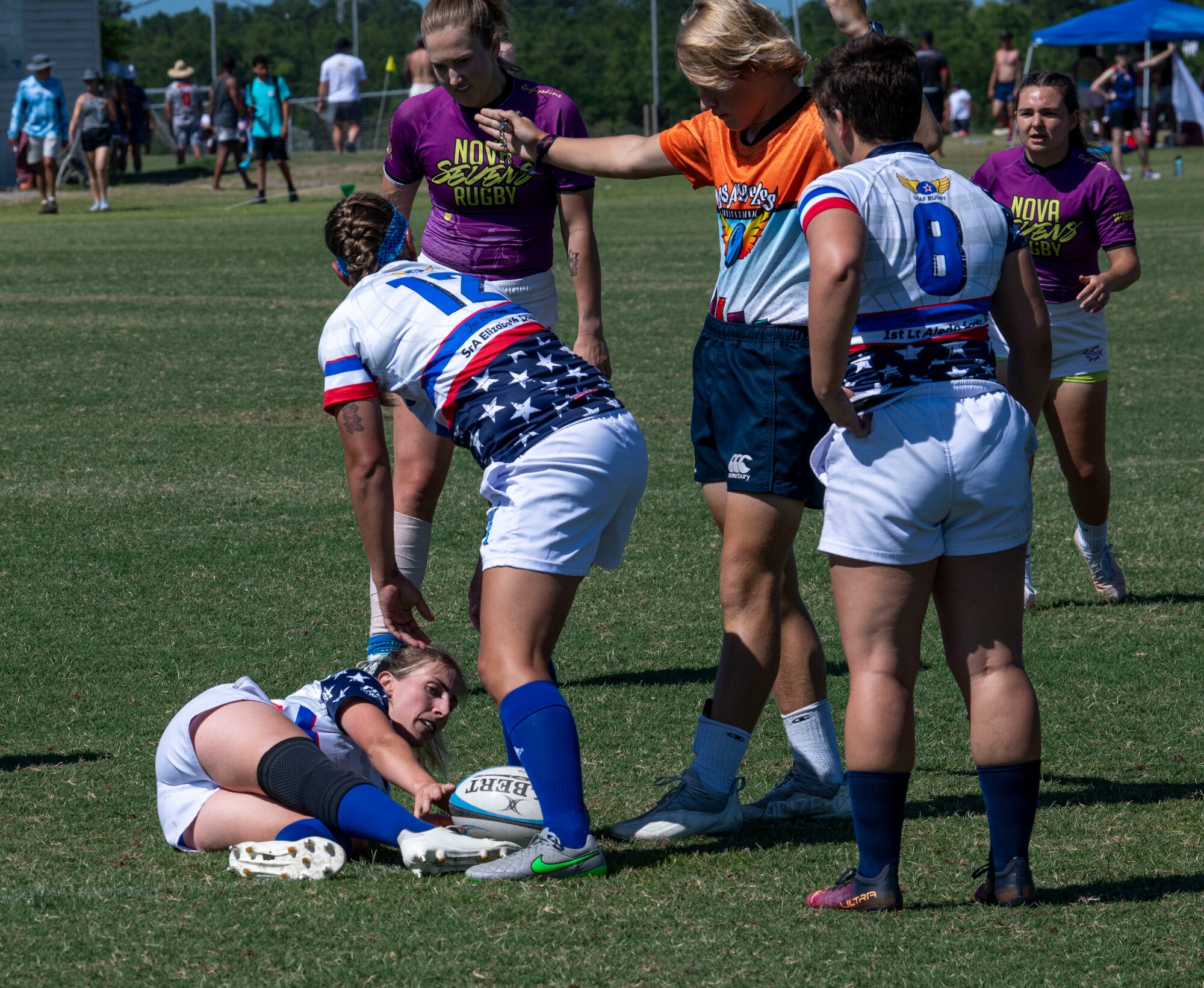 Members of the Department of Air Force Women's Rugby Team receive a call from the referee during a game against the Northern Virginia Rugby Team after competing in the Annual Armed Forces Women’s Rugby Championship in Wilmington, North Carolina, June 26, 2022. The Department of the Air Force Women’s Rugby Team placed second overall. (U.S. Air Force photo by Airman 1st Class Sabrina Fuller)