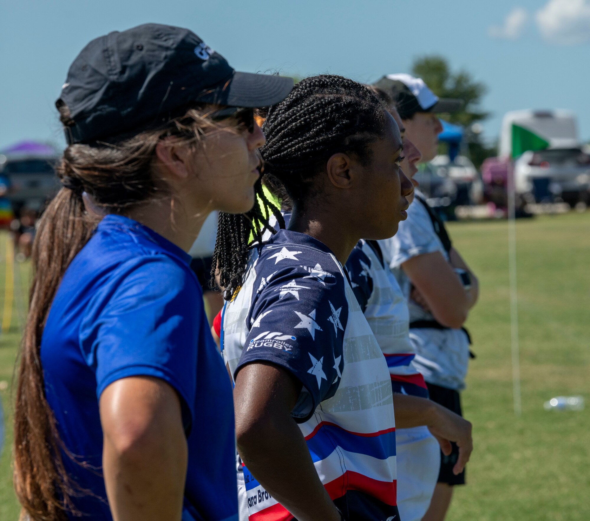 Members of the Department of Air Force Women's Rugby Team watch a game against the Northern Virginia Rugby Team after competing in the Annual Armed Forces Women’s Rugby Championship in Wilmington, North Carolina, June 26, 2022. During the championship, the Air Force defeated the Navy 15 - 5, Coast Guard 22 -7 and Marine Corps 25 - 17. They lost their match to the Army by a three-point margin, placing them second overall. (U.S. Air Force photo by Airman 1st Class Sabrina Fuller)