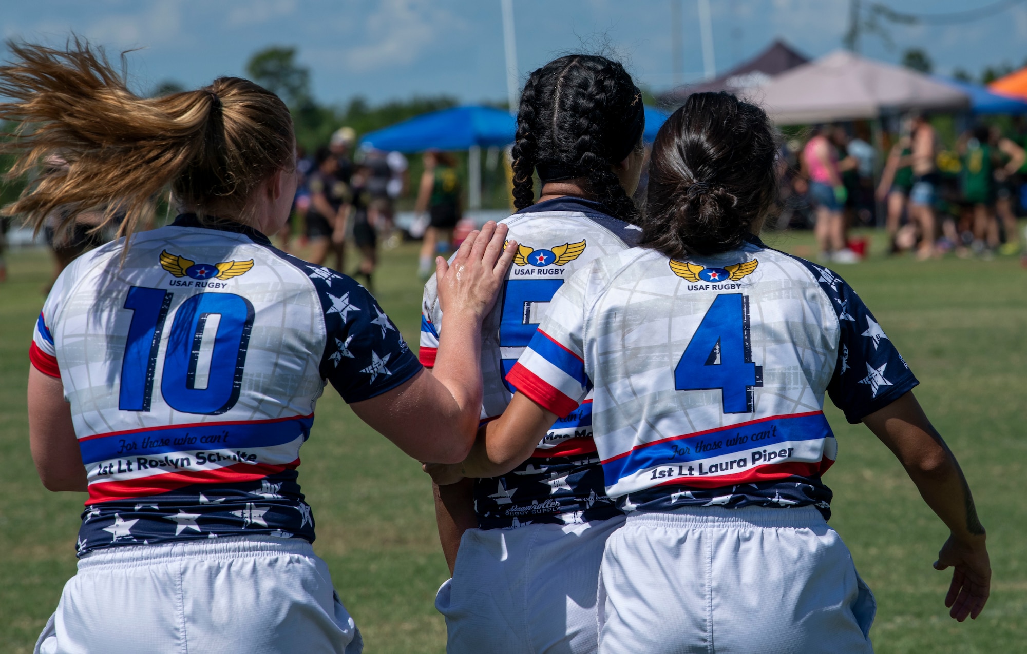 Members of the Department of Air Force Women's Rugby Team gather after finishing a match against the Northern Virginia Rugby Team after competing in the Annual Armed Forces Women’s Rugby Championship in Wilmington, North Carolina, June 26, 2022. The championship was hosted for three days with tournaments dedicated to the Armed Forces teams and civilian teams across the United States. (U.S. Air Force photo by Airman 1st Class Sabrina Fuller)